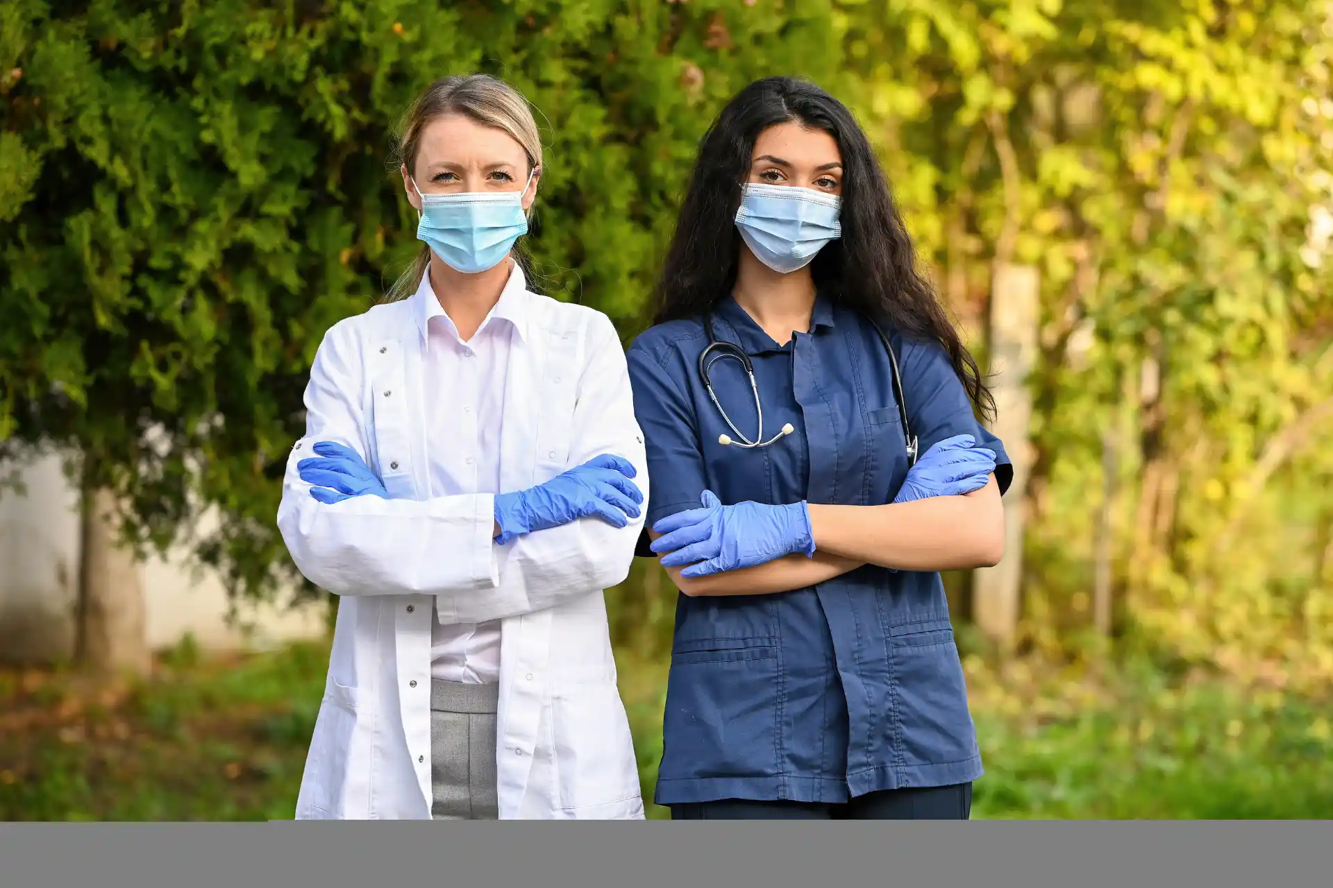 Healthcare professional wearing a custom medical scrub top made in the USA
