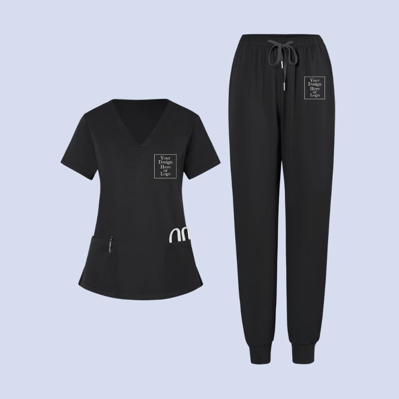 Black medical scrub top and pants with customizable logo placement