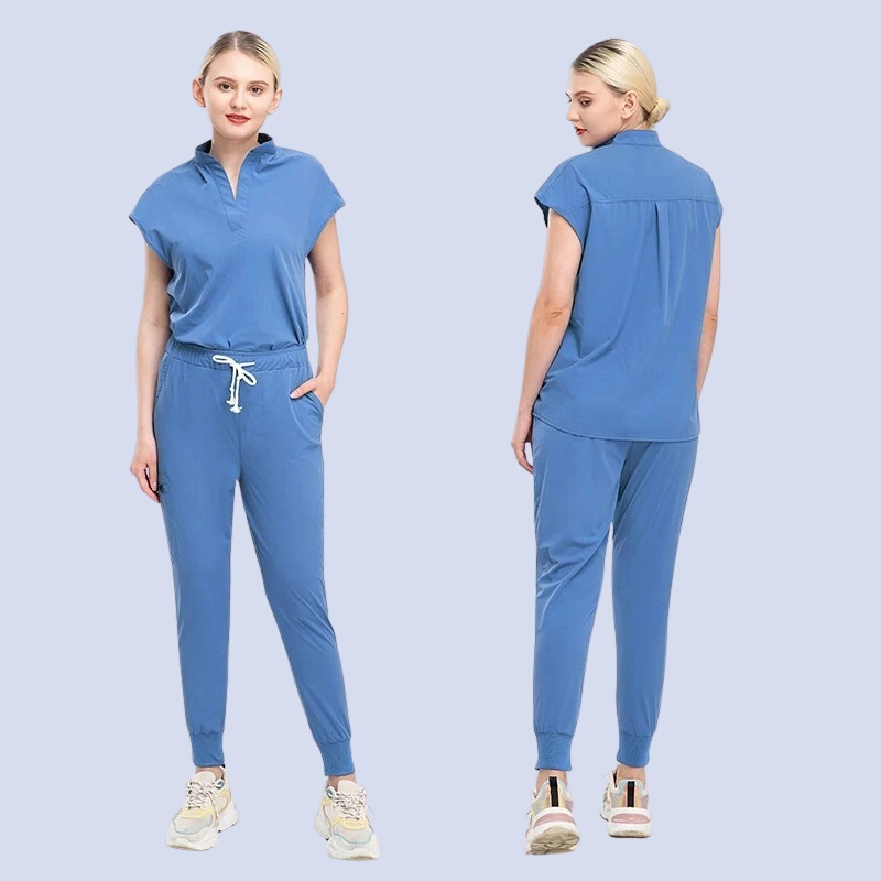Woman wearing blue Custom medical scrub set shown from front and back