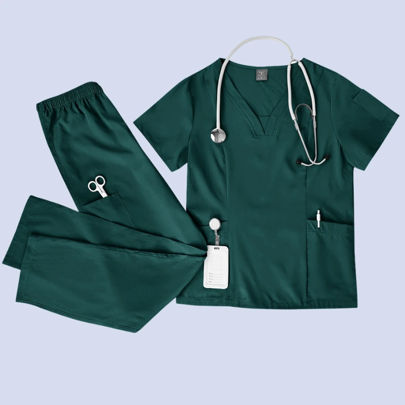 Green medical scrub top and pants set with stethoscope and accessories